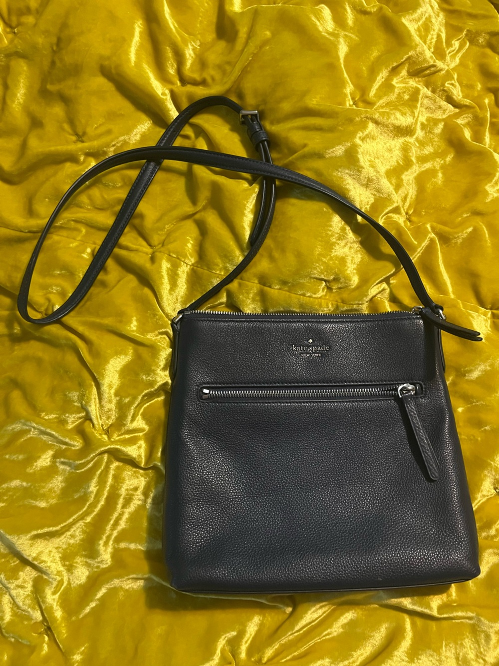 Kate Spade black pebbled leather crossbody with front zip